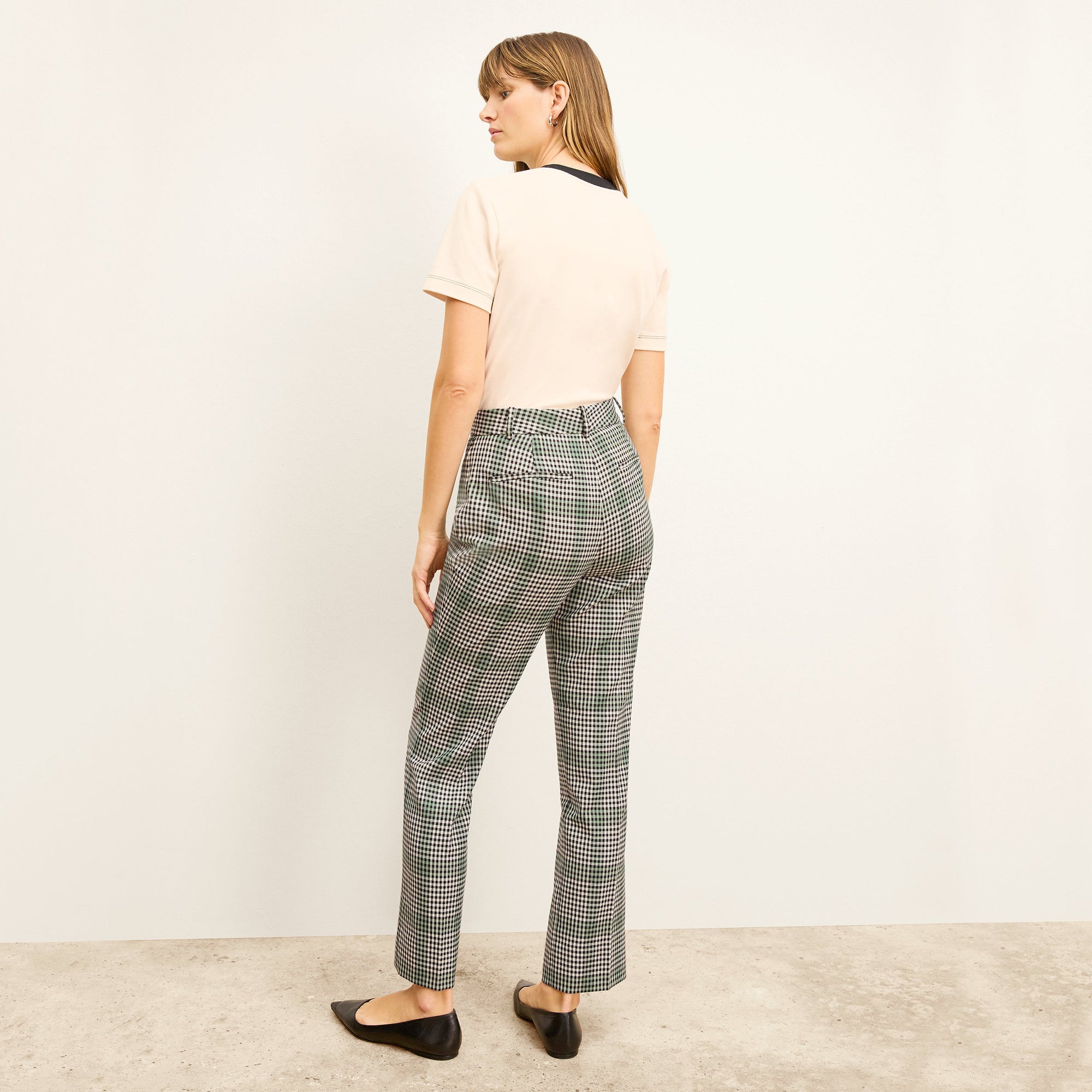 back image of a woman wearing the smith pant in check plaid