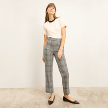 front image of a woman wearing the smith pant in check plaid | Lead