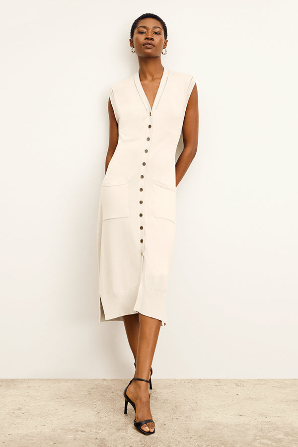 front image of a woman wearing the toula dress in ivory | Exclude | Grid
