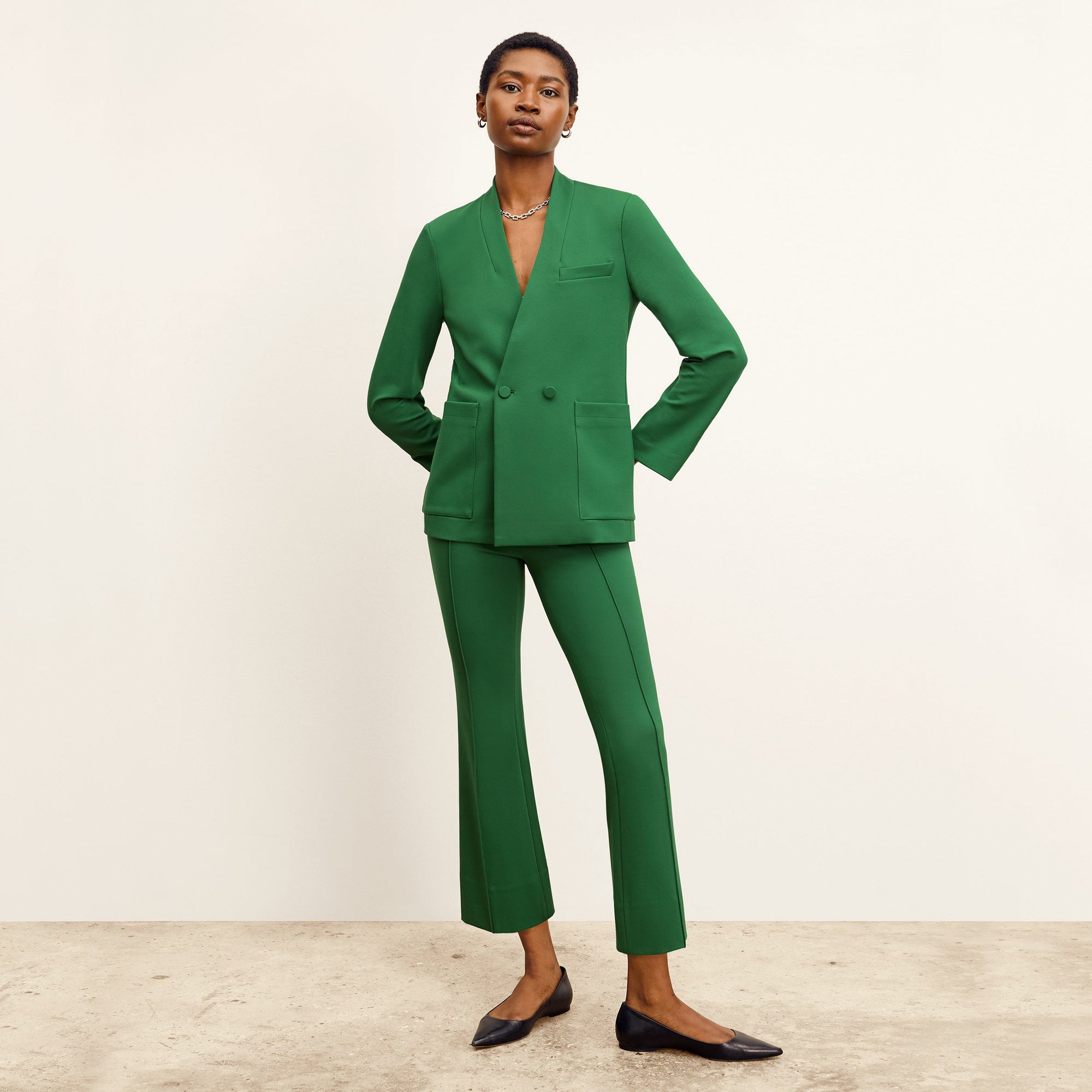 front image of a woman wearing the janette jacket in shamrock 