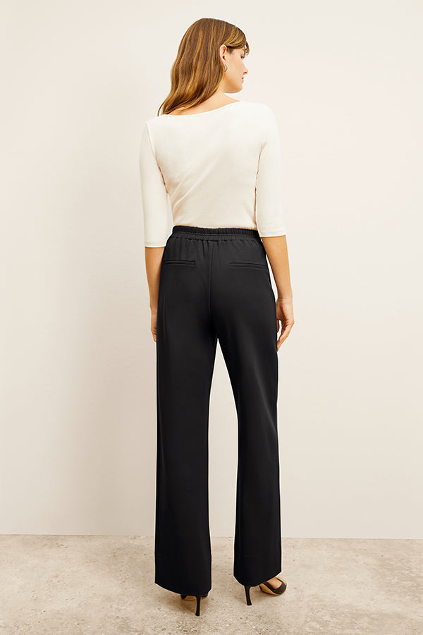 Back image of a woman wearing the Soyoung top in Ivory | Exclude