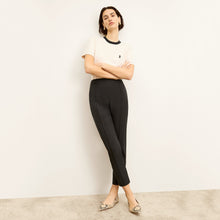 Front image of a woman standing wearing the Colby Jogger in Black