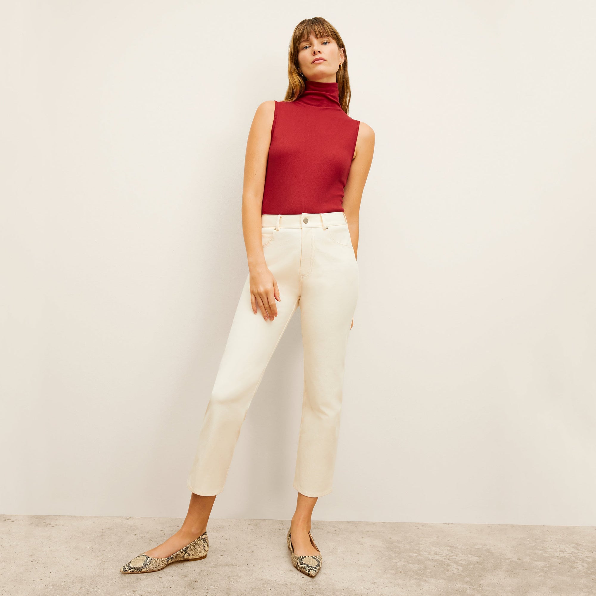 front image of a woman wearing the daria jean in tusk | Exclude