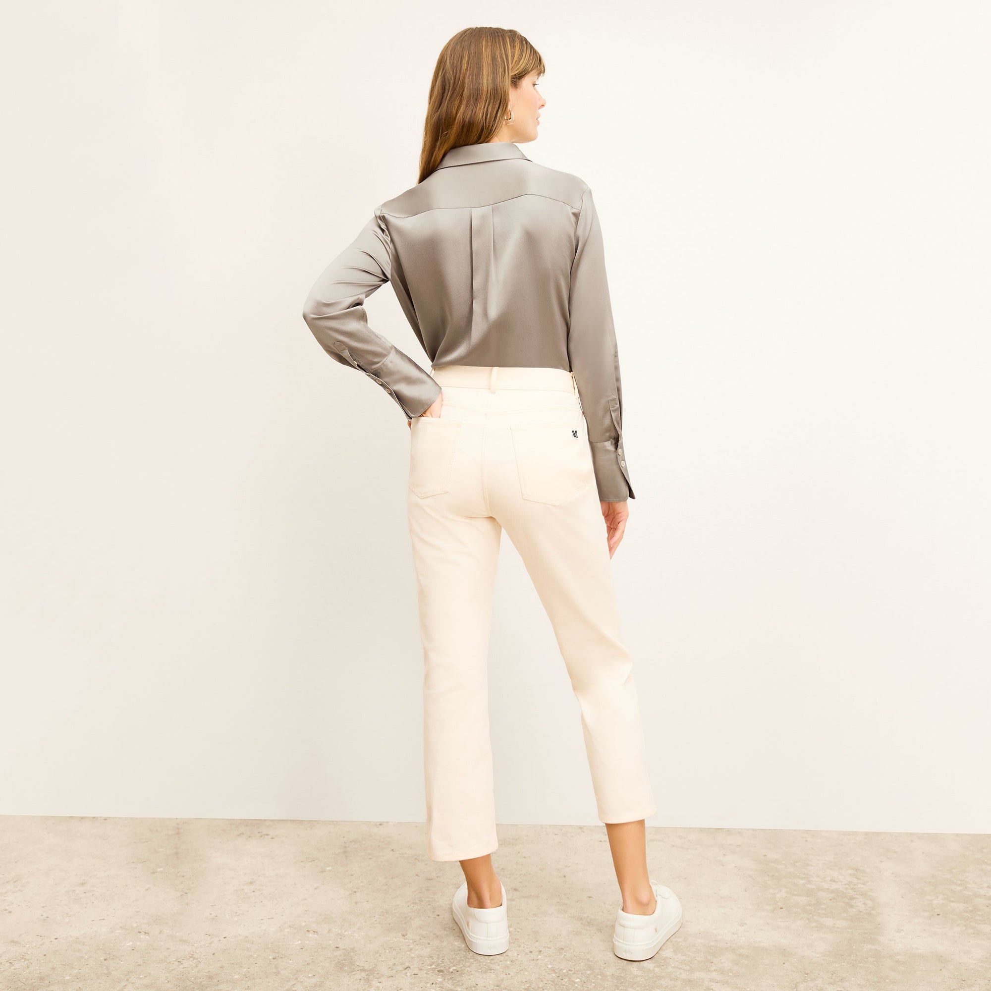 back image of a woman wearing the daria jean in tusk | Exclude