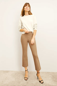 Front image of a woman wearing the kick flare foster | Grid | Exclude