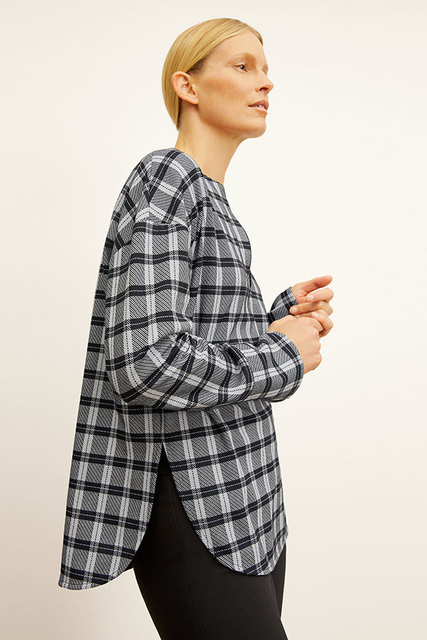 front image of a woman wearing the tully top in checkmate | Exclude