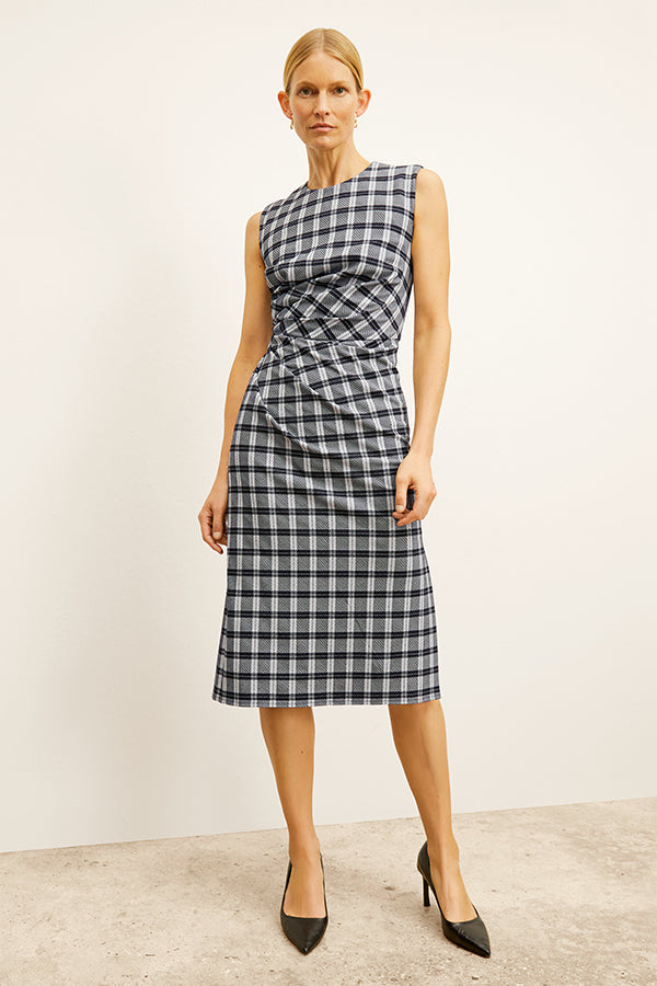 front image of a woman wearing the jeannine dress in checkmate | Exclude | Grid