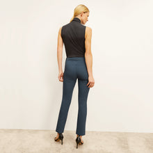 back image of a woman wearing the foster pant in lakeside