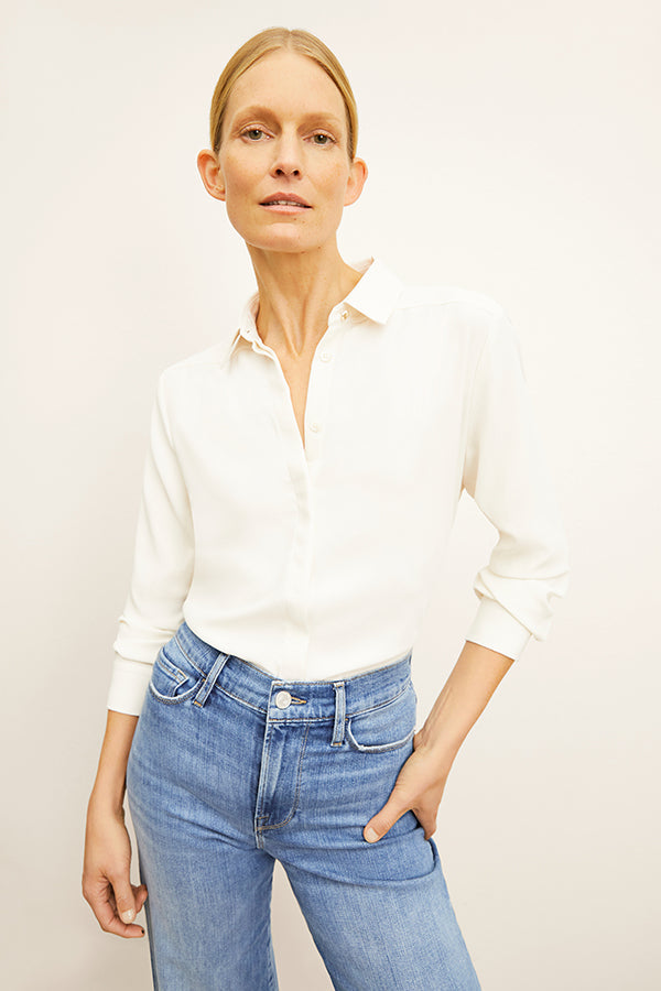 Front image of a woman standing wearing the Lagarde Shirt—Soft Wave in Alabaster | Grid | Exclude