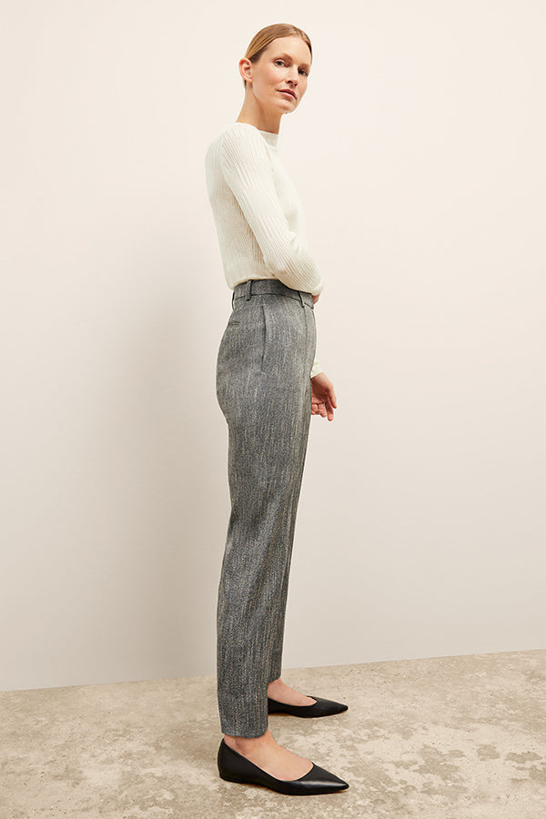front image of a woman wearing the brodie top in ivory | Exclude