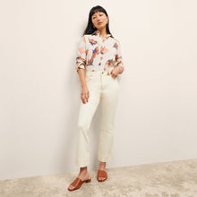 Front image of a woman wearing the Archie Jean in Tusk