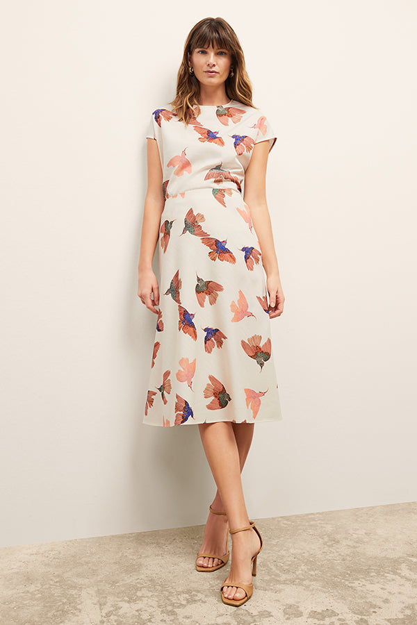 front image of a woman wearing the orchard skirt in hummingbird print | Exclude | Grid Hover