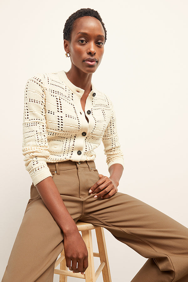 front image of a woman wearing the milo jean in saddle | Exclude