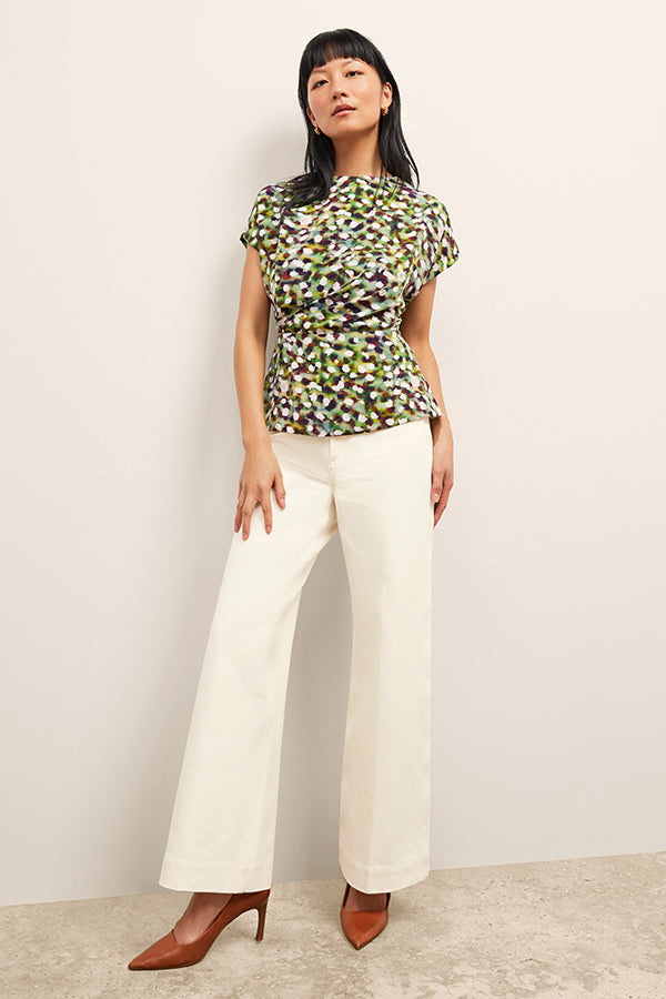 Front image of a woman wearing the Milo Jean in Tusk | Exclude