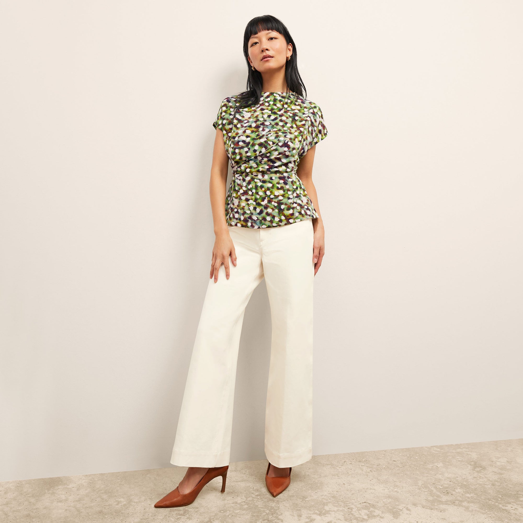 Front image of a woman wearing the Milo Jean in Tusk | Exclude