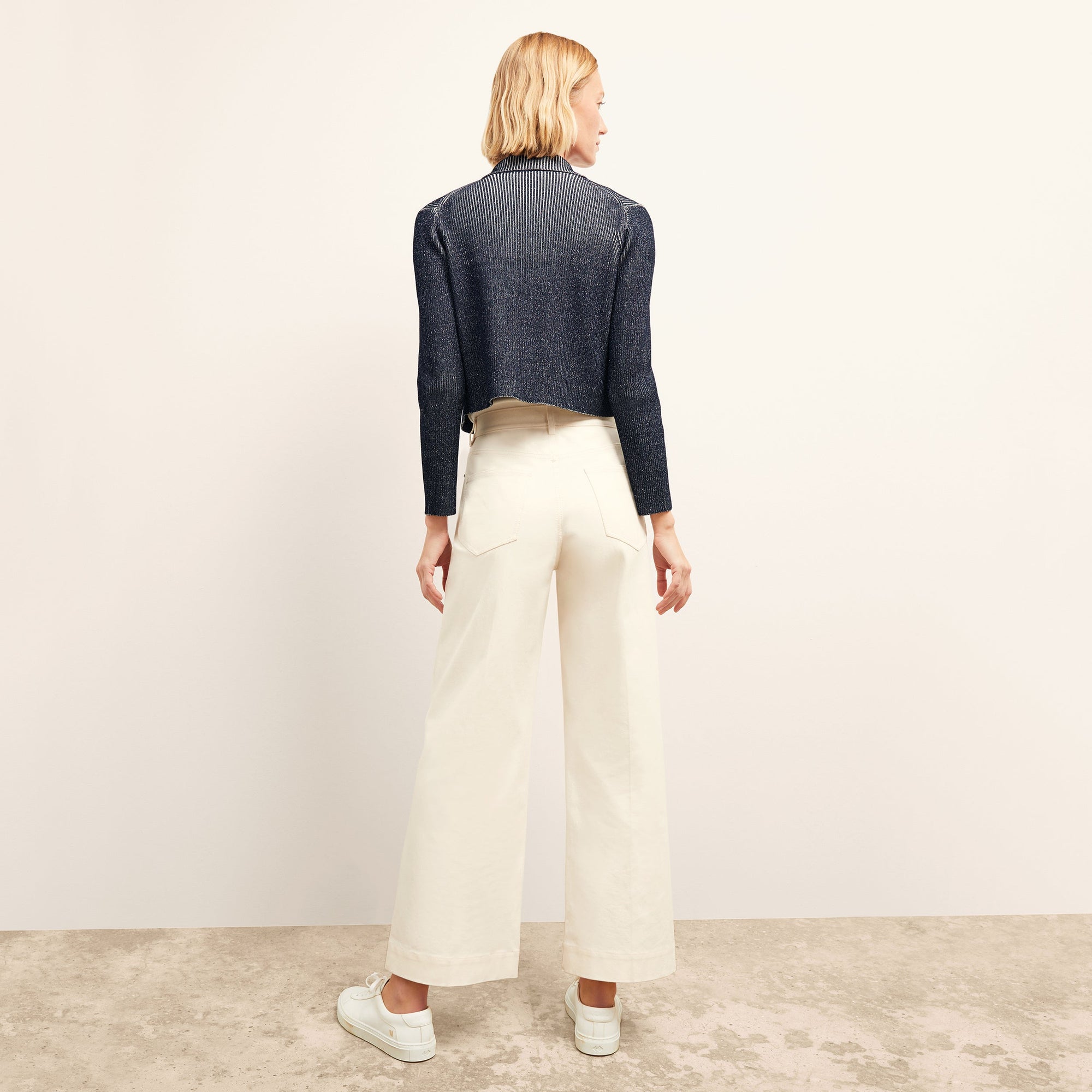 Back image of a woman wearing the Milo Jean in Tusk | Exclude