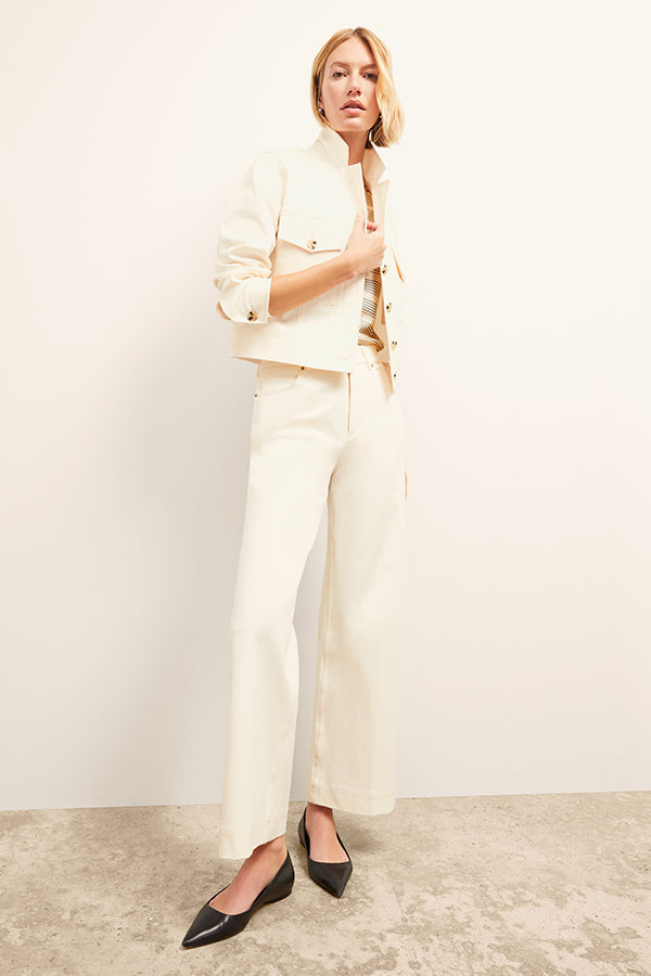 Front image of a woman wearing the Milo Jean in Tusk | Exclude | Grid