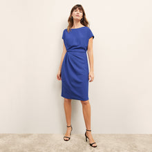 front image of a woman wearing the jillian dress in royal blue