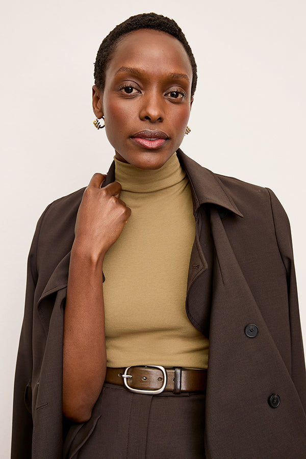 Front image of a woman wearing the Jett Tank in Saddle | Exclude