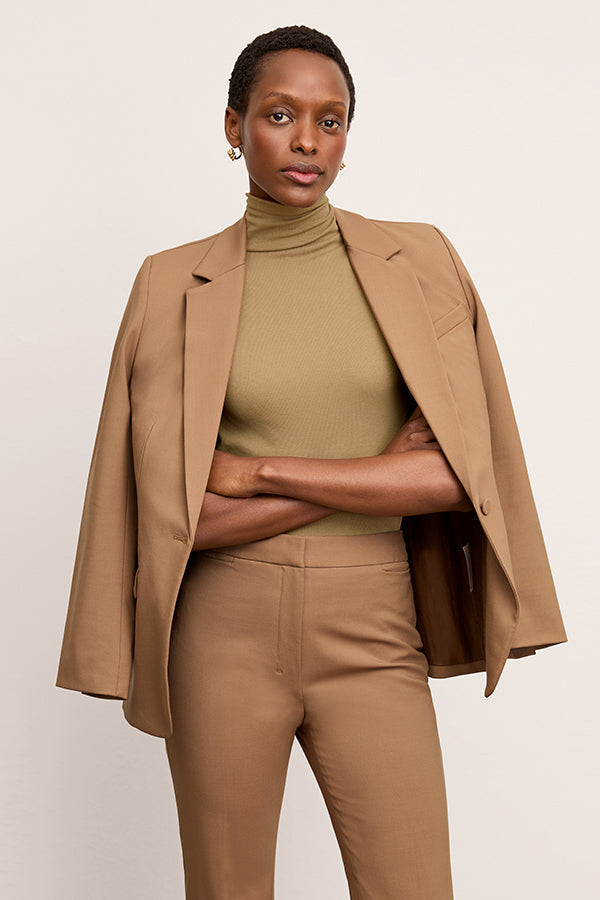Front image of a woman wearing the Jett Tank in Saddle | Exclude