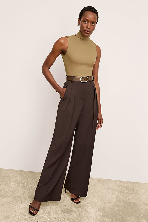 Front image of a woman wearing the Jett Tank in Saddle | Exclude
