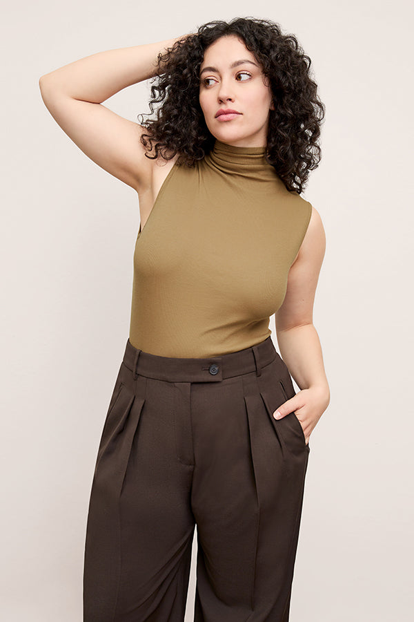 Front image of a woman wearing the Jett Tank in Saddle | Exclude | Grid Hover