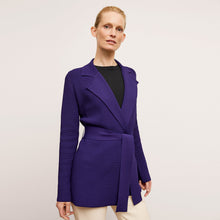 front image of a woman wearing the textured merritt jardigan in amethyst | Lead 