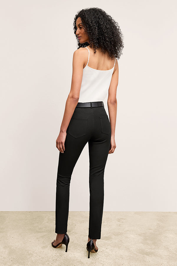 front image of a woman wearing the roma jean in black | Exclude