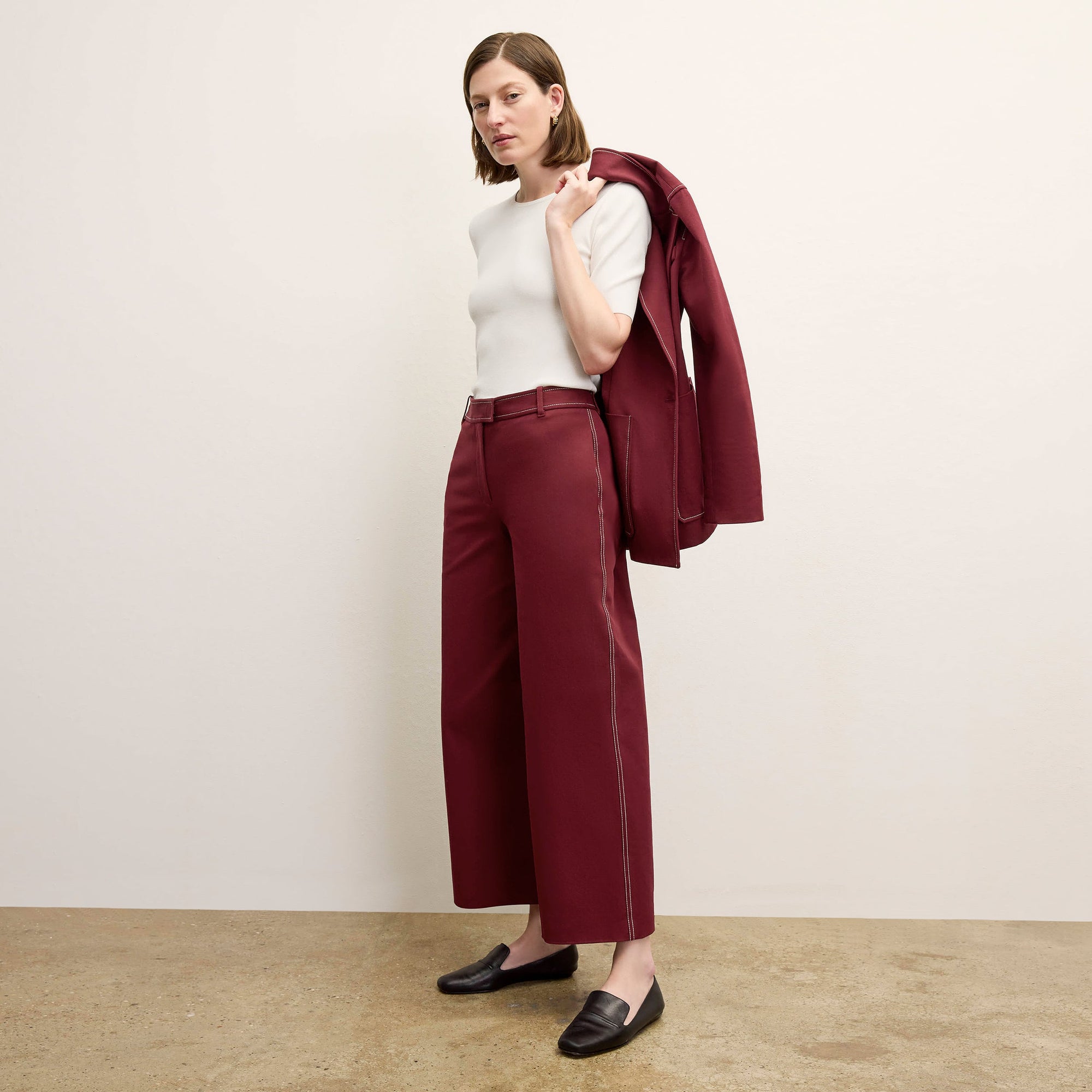 front image of a woman wearing the abby pant in berry jam | 