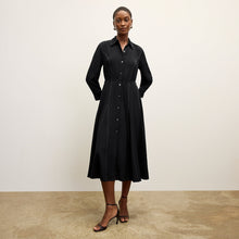 front image of a woman wearing the pepper dress in black | Lead