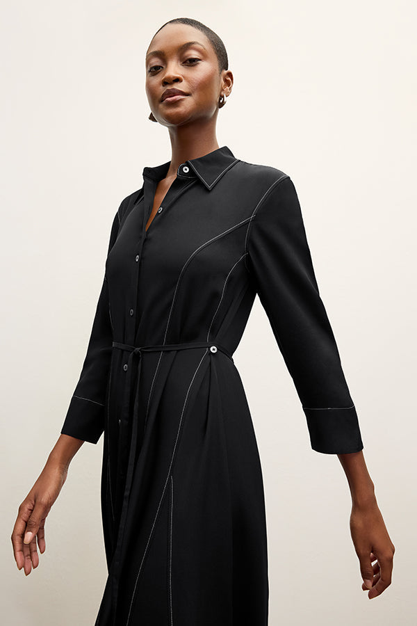 front image of a woman wearing the pepper dress in black | Exclude