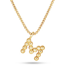Stone and Strand Gold Vermeil Mochi Donut Initial Necklace Close Up M Image