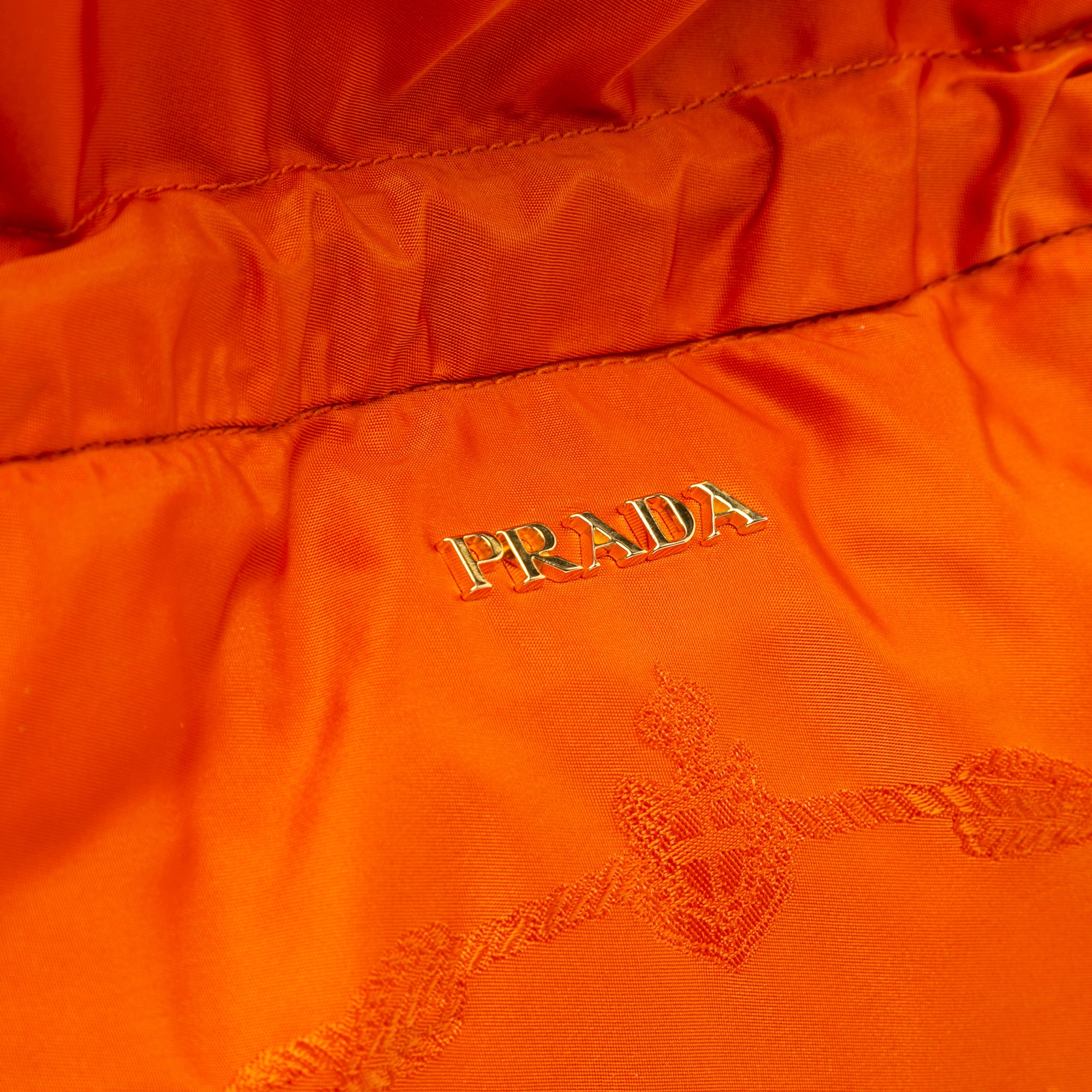 Prada | Pre-Owned Tessuto Logo Drawstring Tote | Orange