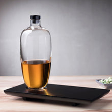 Nude Glas Whisky bottle Tall with wooden tray lifestyle shot