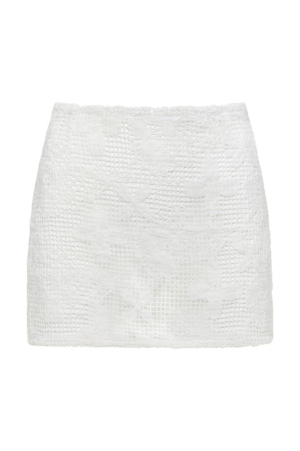 White floral lace micro skirt with textured pattern and fitted waistband.