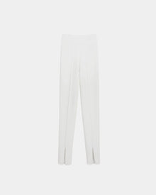 The MATHILDA - 8524515 Iceland white front ankle slit leggings by Rudsak bring modern elegance to your look.