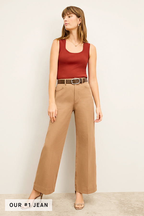 front image of a woman wearing the milo jean in saddle | Exclude | Grid
