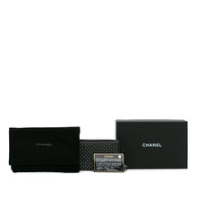 Chanel | Pre-Owned Bull Leather Studded Zip Wallet | Black