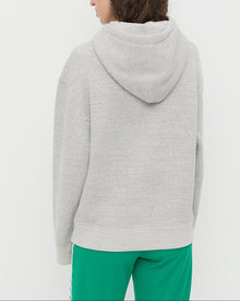 Nova Hoodie in grey cotton and Venus Track Pant in green cotton.