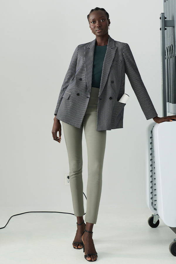 Front image of a woman wearing the skinny foster in thyme | Exclude | Grid Hover
