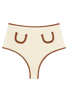 Oat-colored bikini bottom with terracotta binding trim and U-shaped cutout details on front.