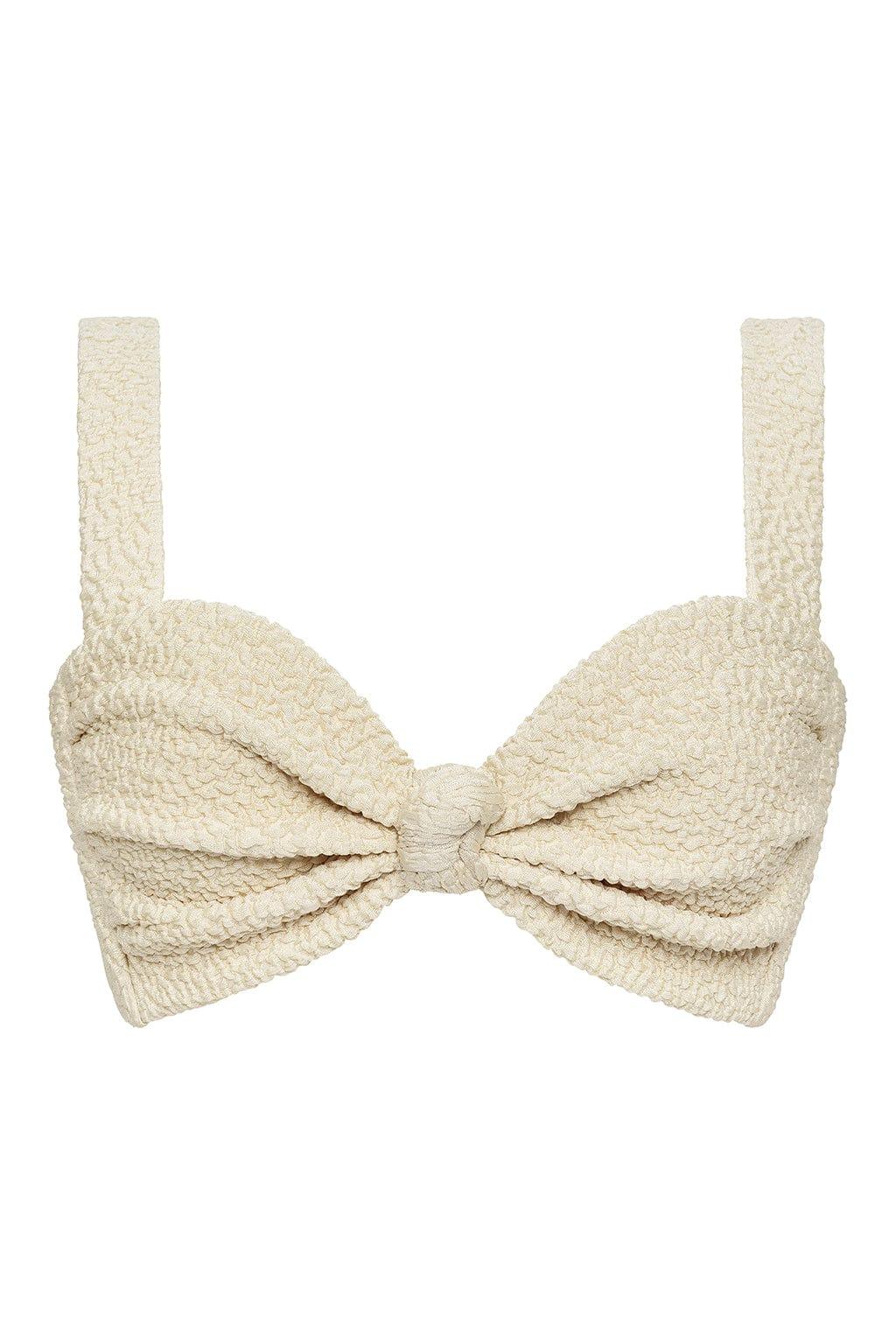 Oat-colored textured bikini top with bow detail and adjustable shoulder straps.