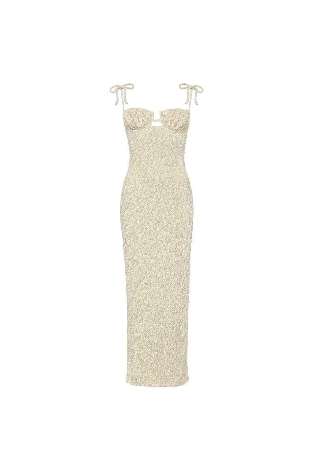 Beige textured long slip dress with sweetheart neckline and tie shoulder straps.