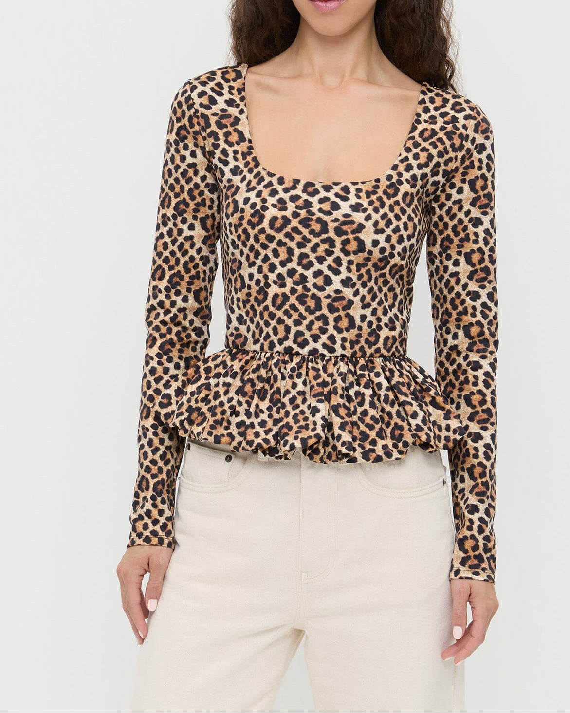 Posie Peplum Top in leopard print jersey material and Winona Denim Barrel Pants in natural.