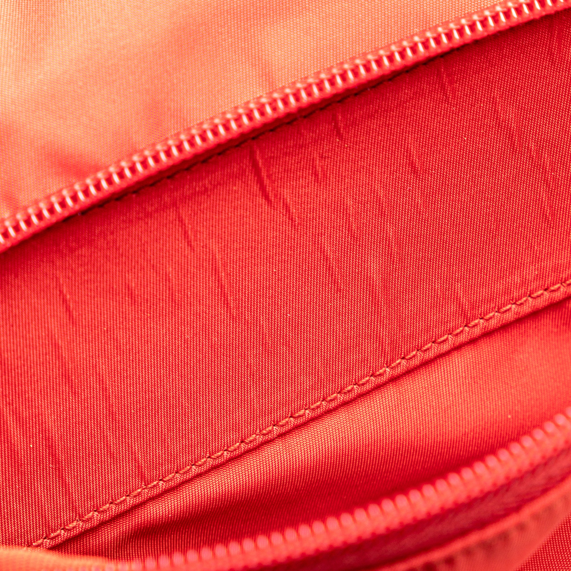 Prada | Pre-Owned Tessuto Zip Buckle Messenger Bag | Red