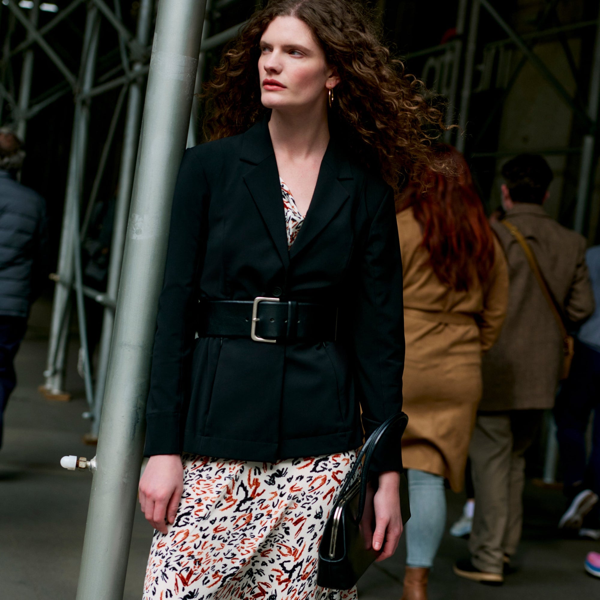front image of a woman wearing the priya dress in leopard sketch | Exclude