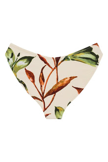 Cream bikini bottom with green, rust, and brown floral botanical print and zig-zag stitching at edges.