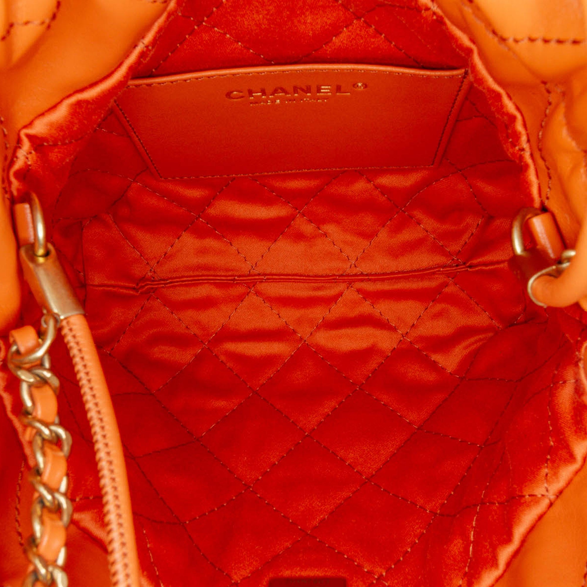 Chanel | Pre-Owned Mini Shiny Calfskin 22 Handbag | Orange