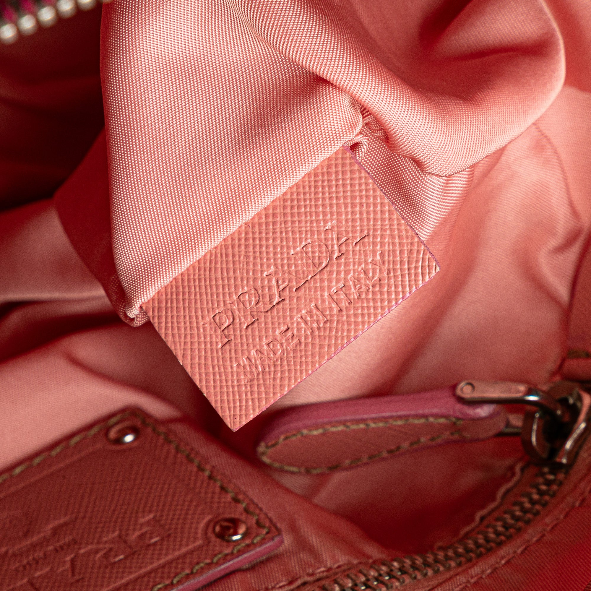 Prada | Pre-Owned Saffiano Trimmed Tessuto Zip Top Crossbody | Red