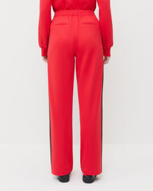Spencer Sweatpant in red and brown jersey, Emerson Soccer Jersey in red and brown jersey, and Raina Red/Black Mesh Flat.